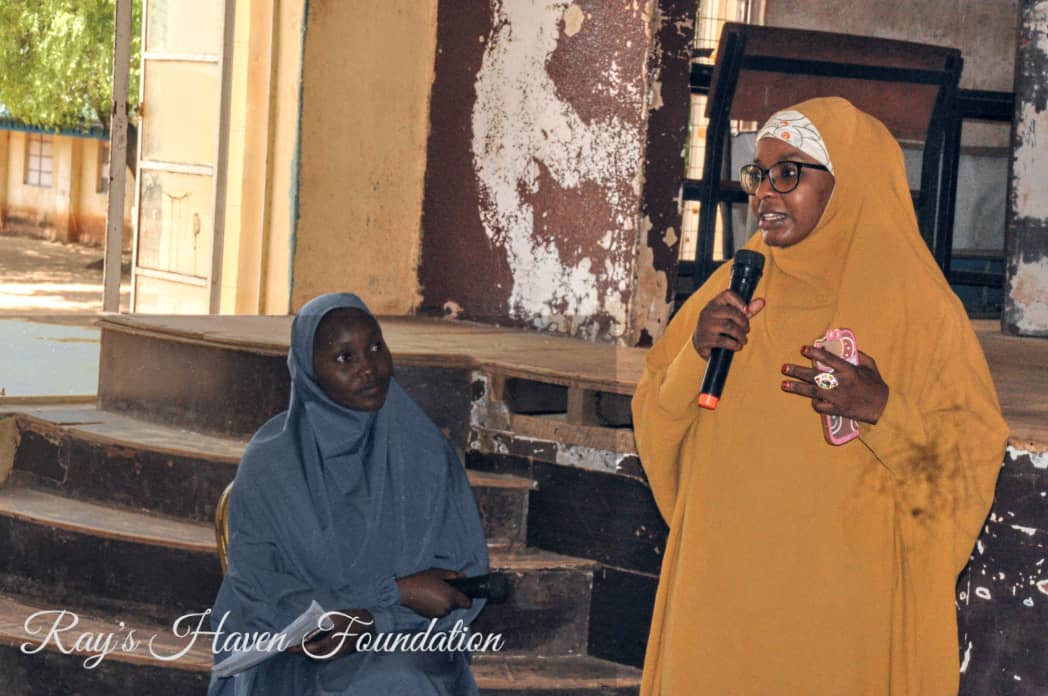 Students receiving self-care kits at the event