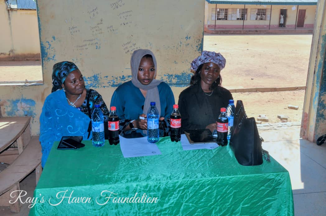 Students receiving self-care kits at the event