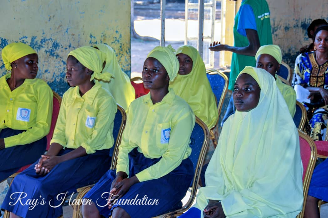 Students receiving self-care kits at the event
