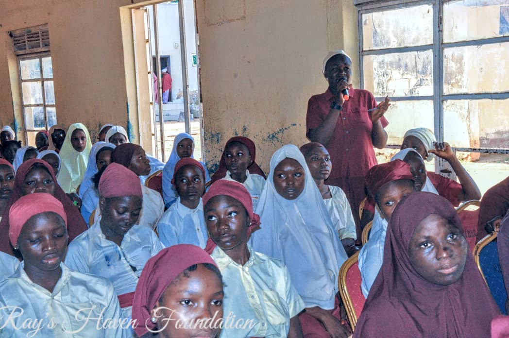 Students receiving self-care kits at the event