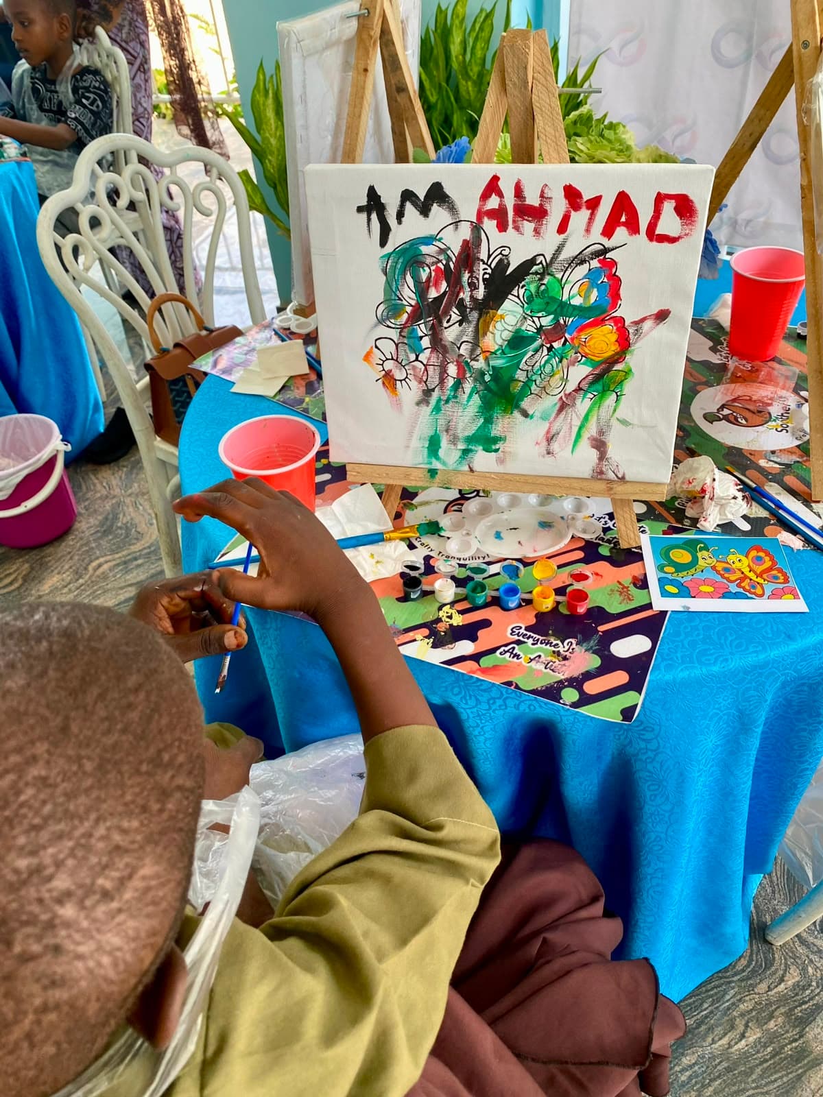 Families connecting through a shared painting experience